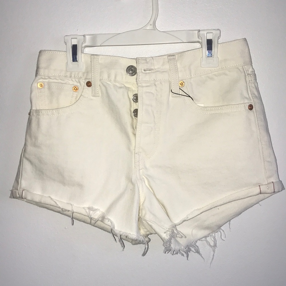 Levi’s High-Waisted Cream Distressed Shorts